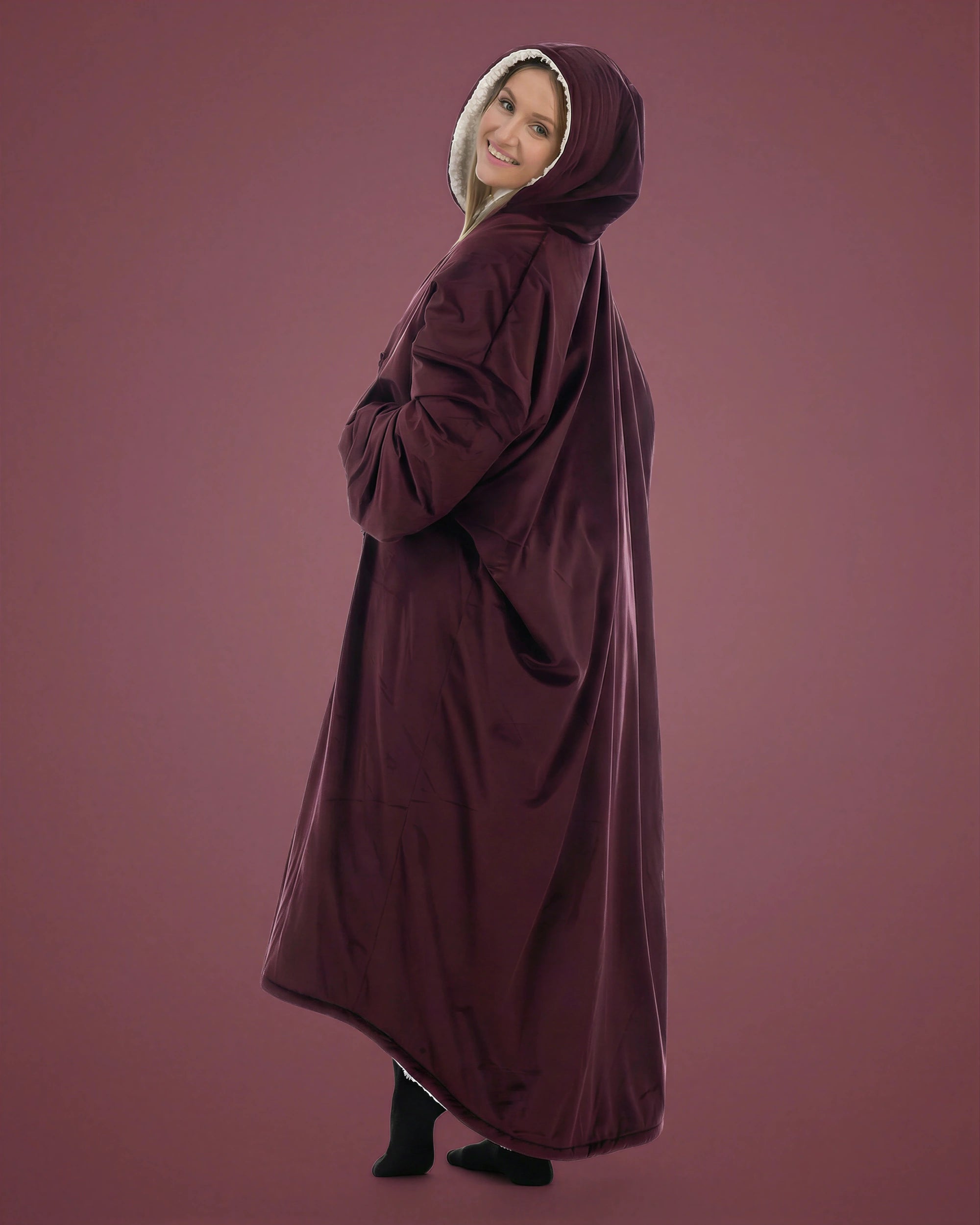 Side and back view of woman wearing The Comfy Original Long in burgundy, showing full length and hooded silhouette.