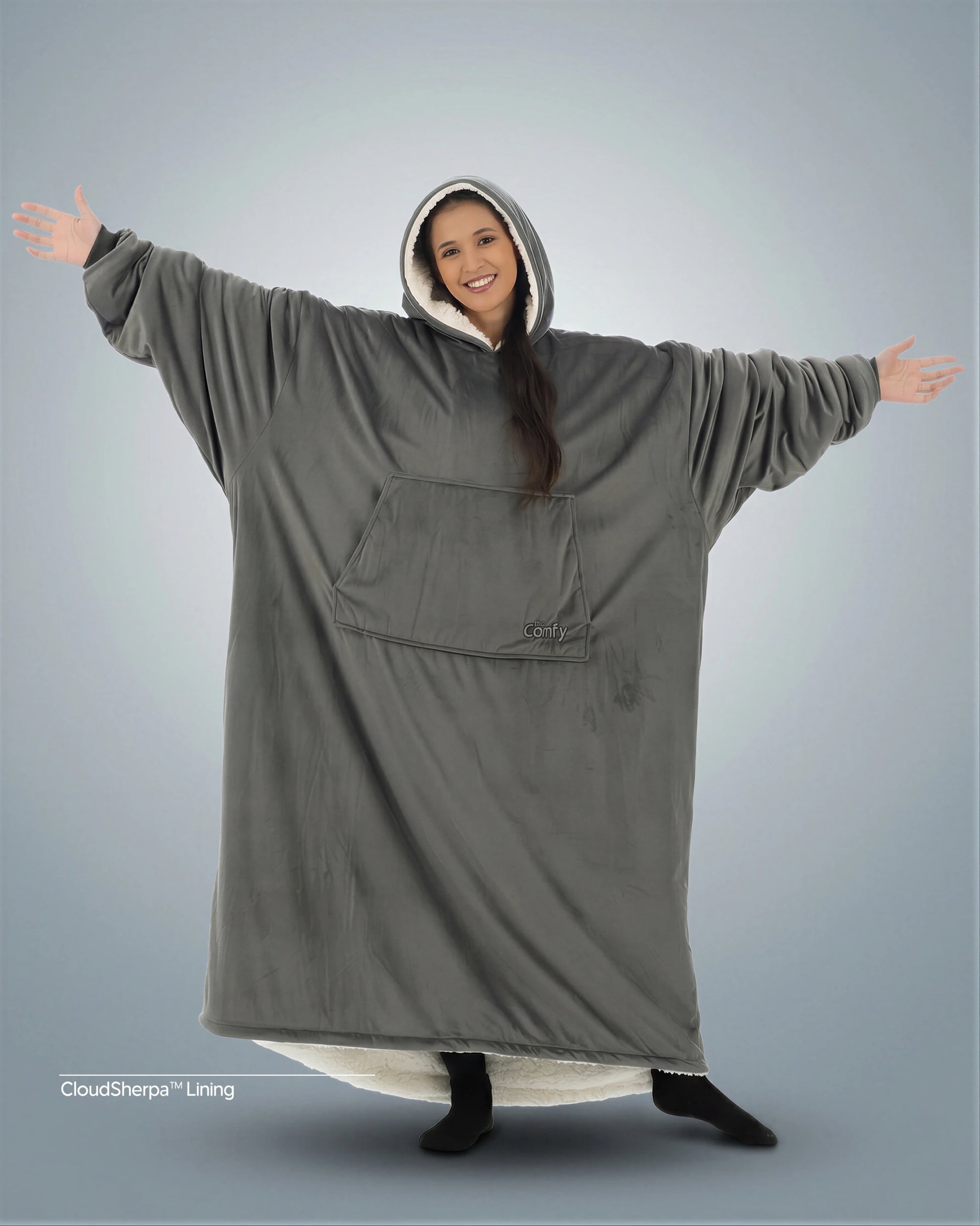 Woman wearing The Comfy Original Long in charcoal with CloudSherpa™ lining, front view showing oversized silhouette.