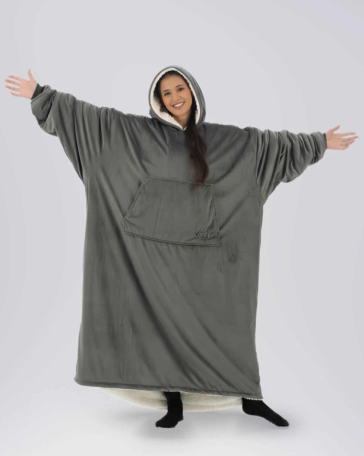 Woman wearing The Comfy Original Long in charcoal with CloudSherpa™ lining, front view showing oversized silhouette.