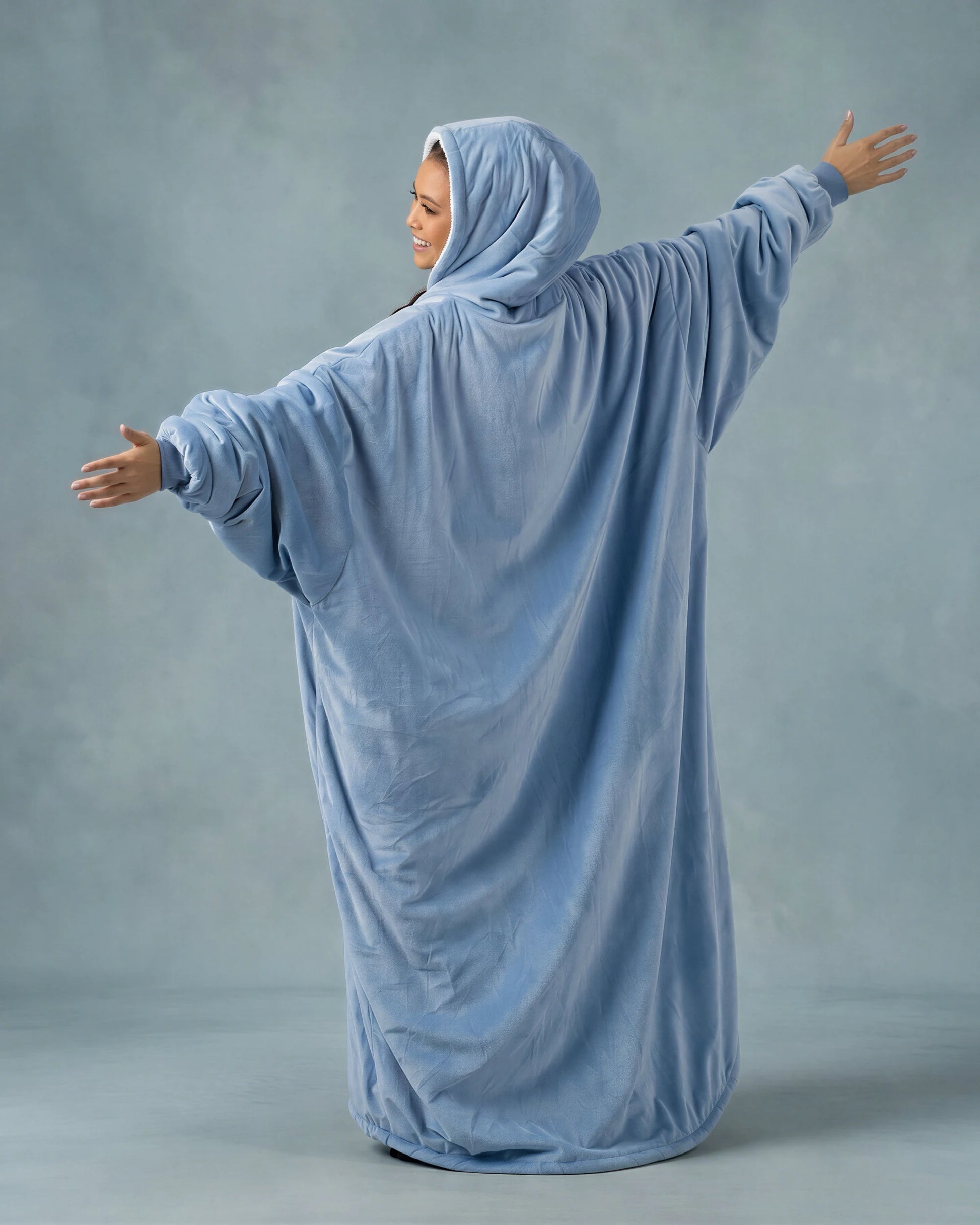 Back view of The Original Long in Serenity Blue, showcasing the extended length, oversized design, and full-coverage comfort from head to toe.