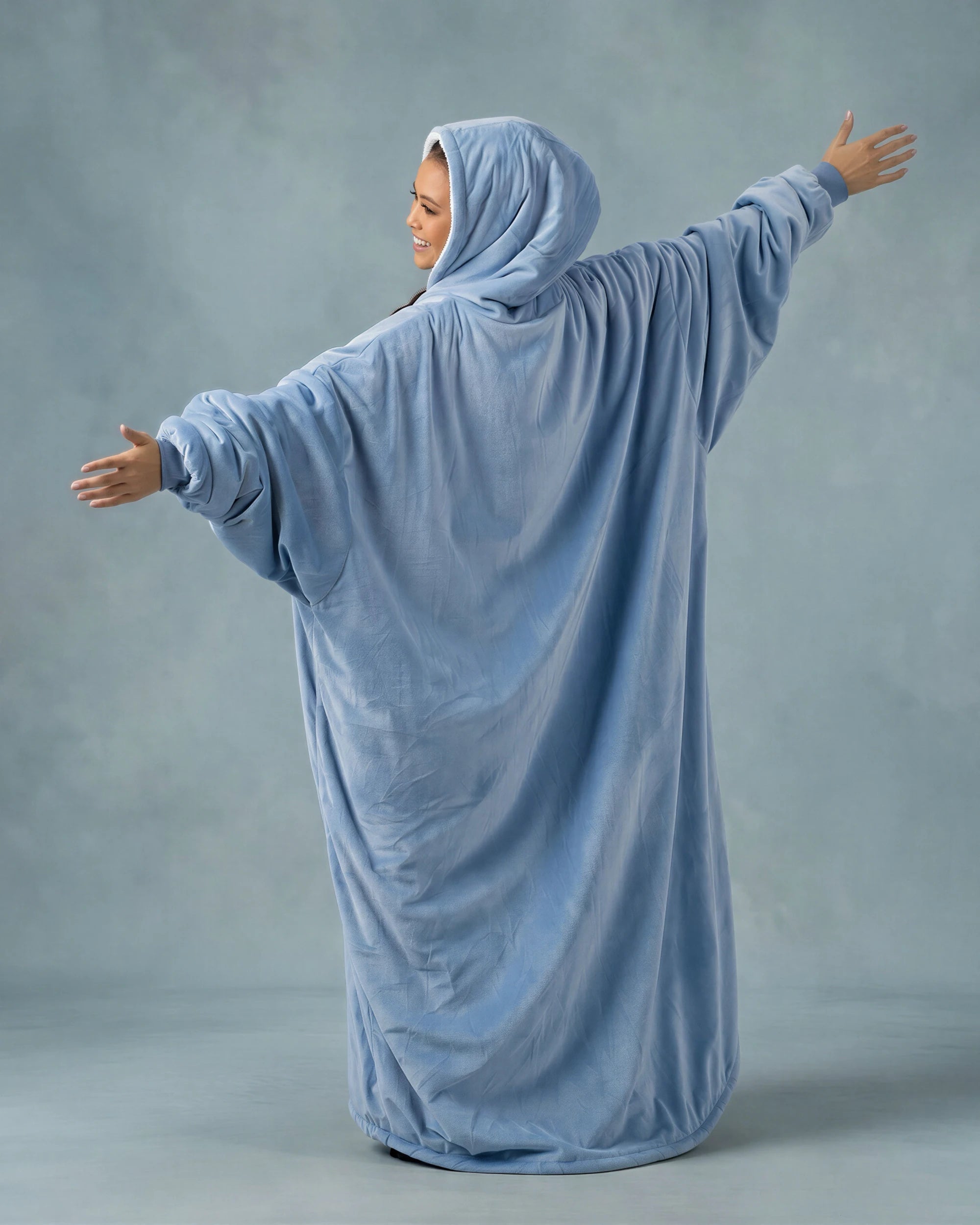 Back view of The Original Long in Serenity Blue, showcasing the extended length, oversized design, and full-coverage comfort from head to toe.