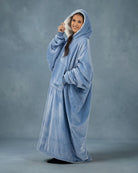 Side view of The Original Long in Serenity Blue featuring the ultra-soft Velveluxe™ exterior and cozy CloudSherpa™ lining, designed for extra warmth and relaxation.
