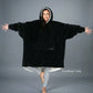 The Original wearable blanket in black with CloudSherpa™ lining shown front view with full body coverage