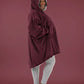 Side view of The Original wearable blanket in burgundy showing oversized fit and hood design