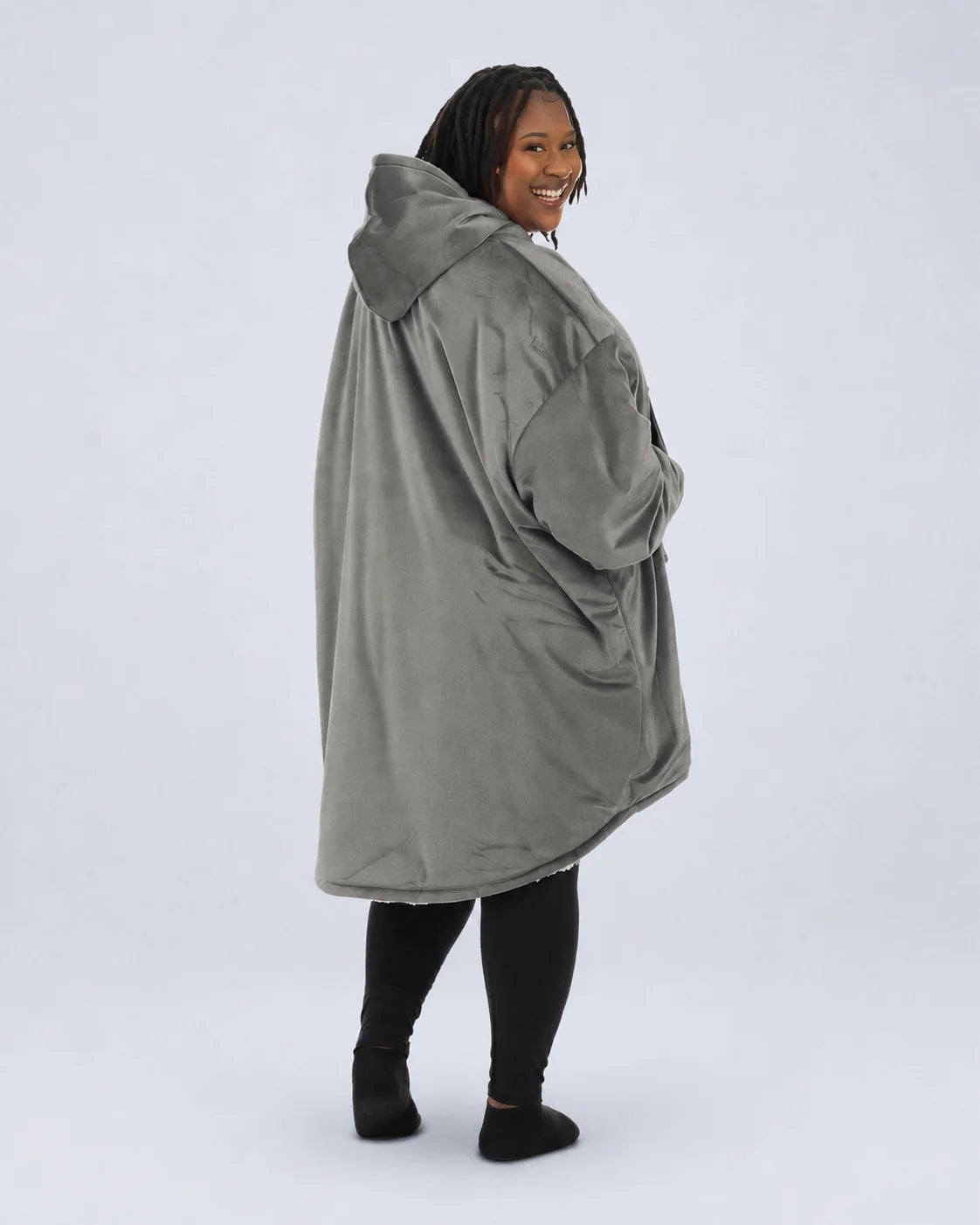 Back view of The Original wearable blanket in charcoal showing oversized fit and hood design