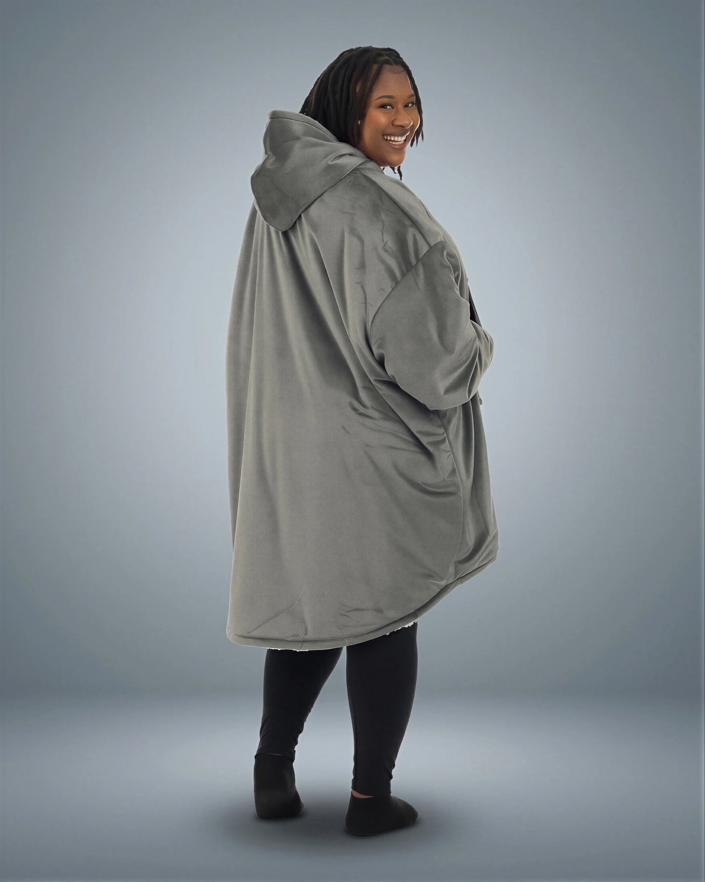 Back view of The Original wearable blanket in charcoal showing oversized fit and hood design