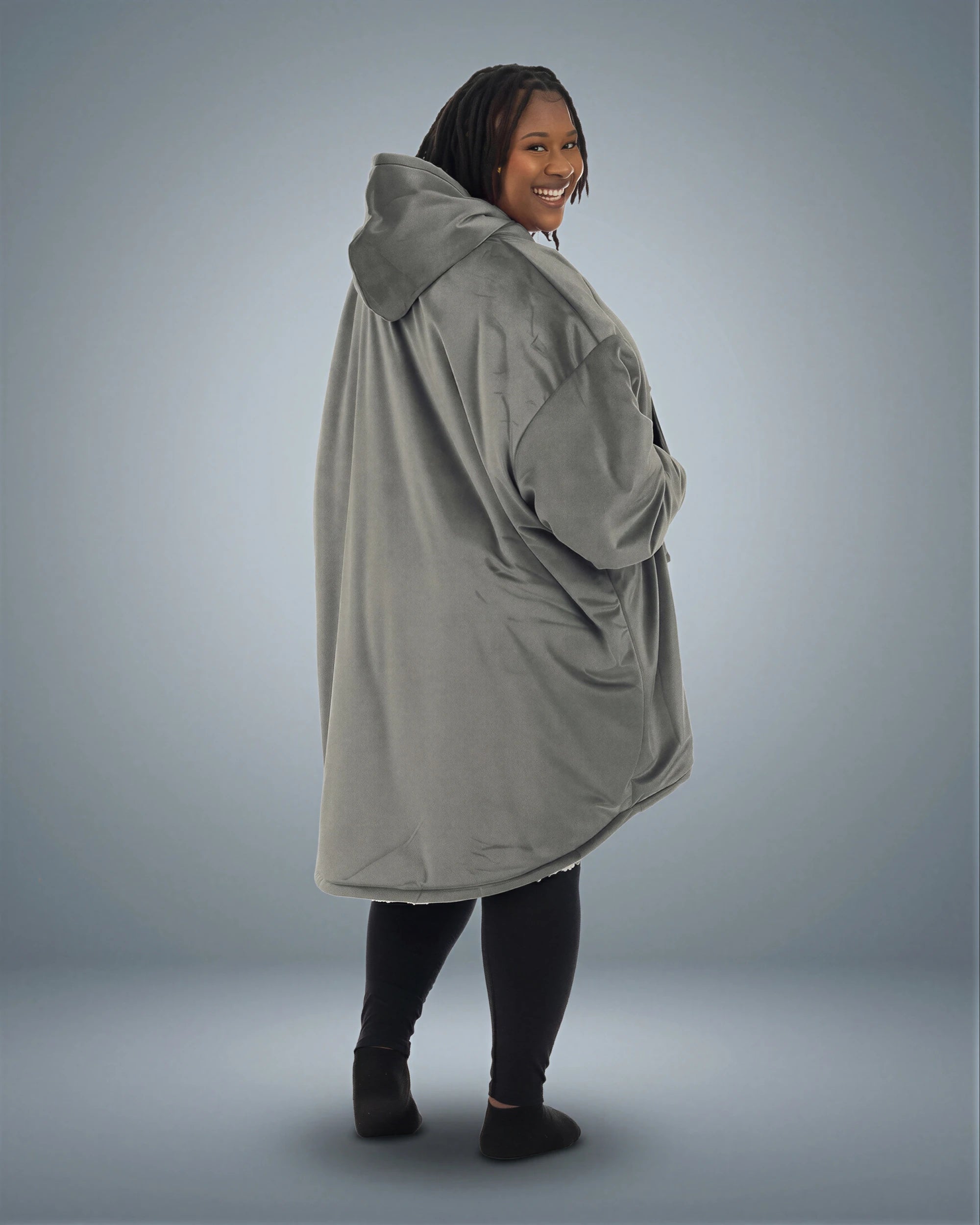 Back view of The Original wearable blanket in charcoal showing oversized fit and hood design