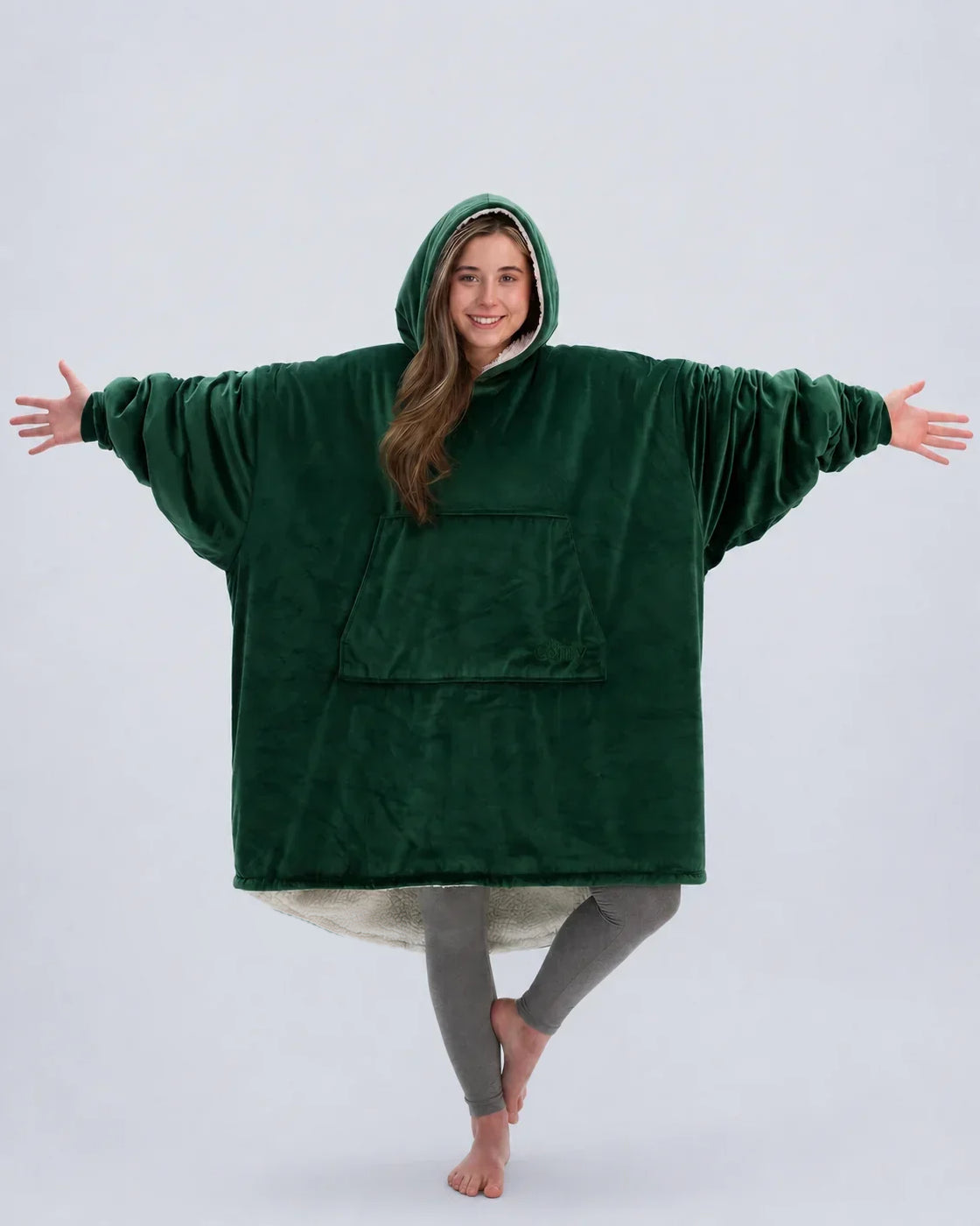 The Original wearable blanket in Dark Green, shown full length with its oversized fit and plush CloudSherpa™ lining.