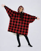 The Original wearable blanket in Red Plaid, shown full length with its oversized fit and plush CloudSherpa™ lining.