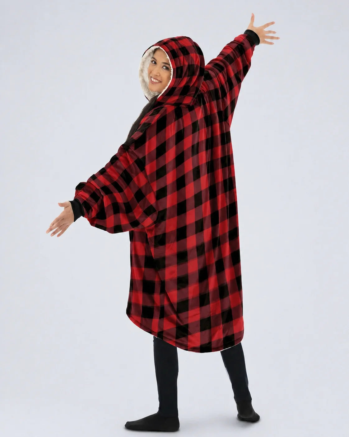 Back view of The Original wearable blanket in red plaid showing oversized fit and hood design