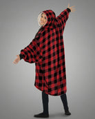 Back view of The Original wearable blanket in red plaid showing oversized fit and hood design