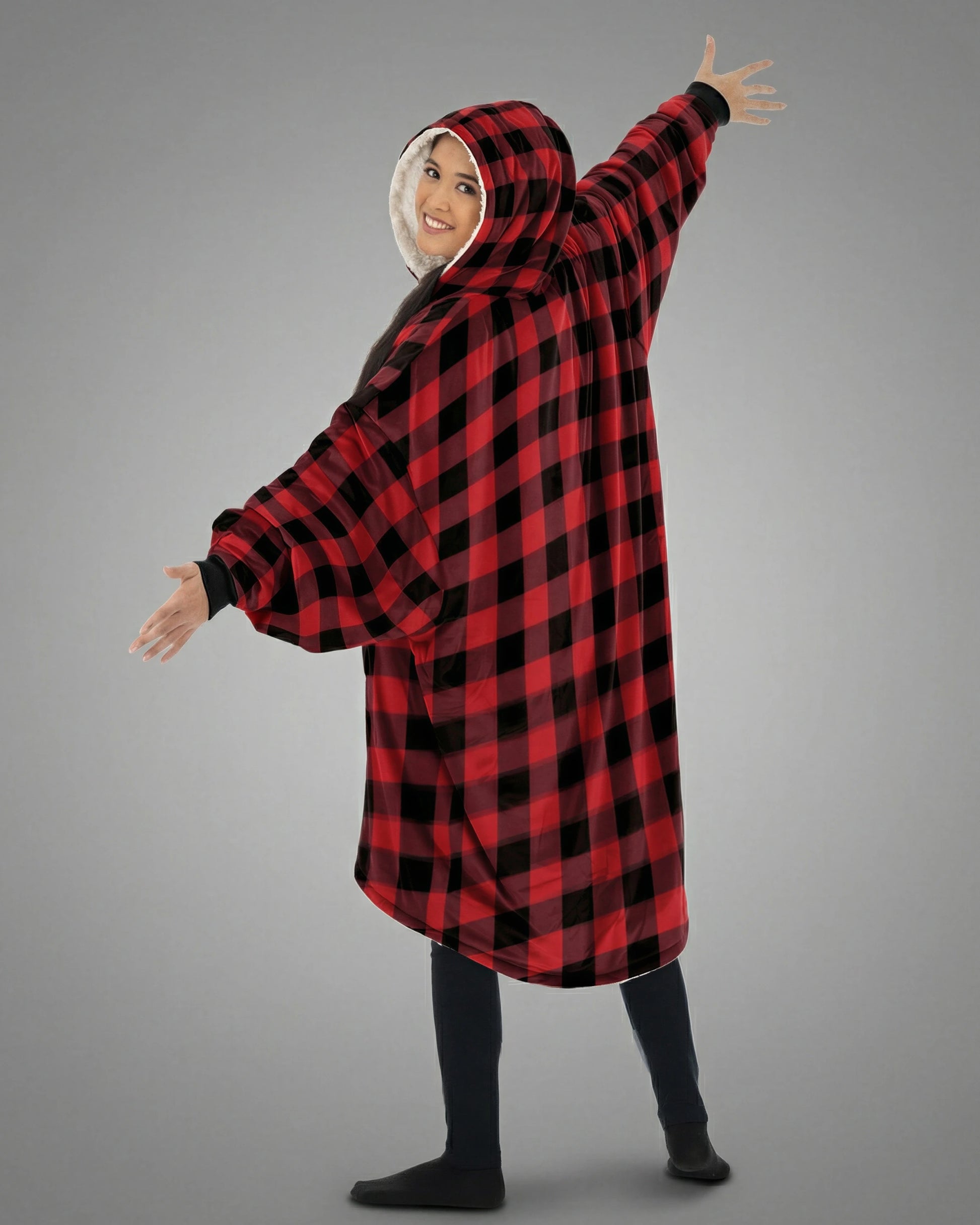 Back view of The Original wearable blanket in red plaid showing oversized fit and hood design