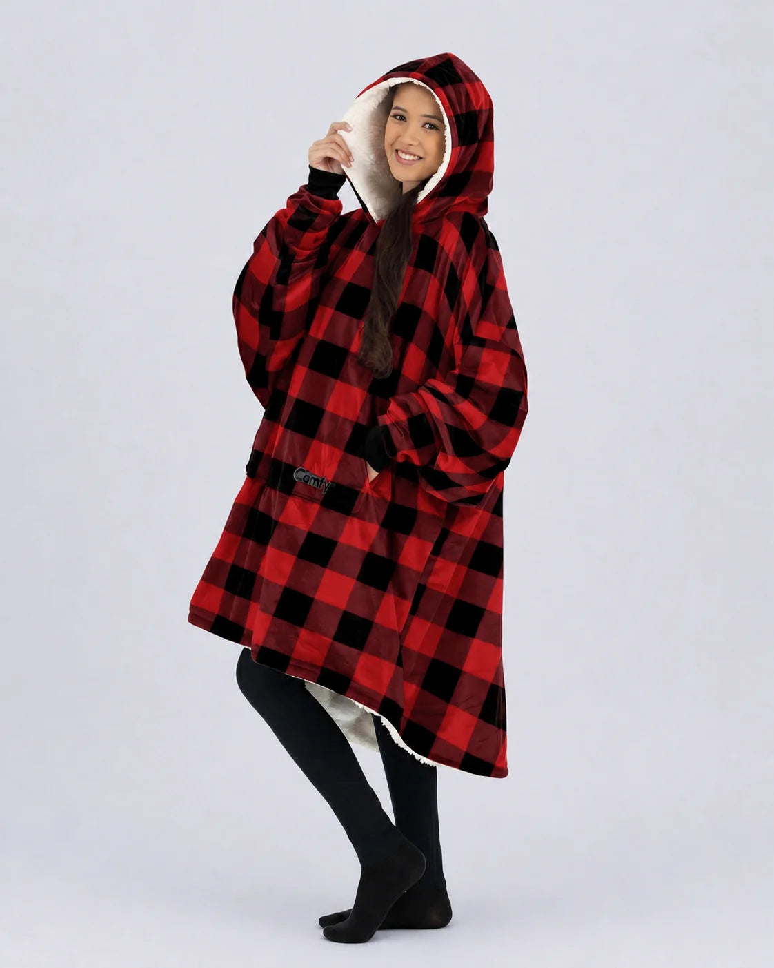 Front /side view of The Original wearable blanket in red plaid showing relaxed oversized comfort and coverage