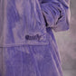 Close-up detail of The Original in Very Perri Purple featuring the ultra-soft Velveluxe™ exterior, oversized kangaroo pocket, embroidered logo, and premium construction details.