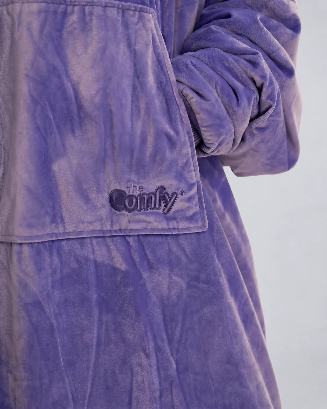 Close-up detail of The Original in Very Perri Purple featuring the ultra-soft Velveluxe™ exterior, oversized kangaroo pocket, embroidered logo, and premium construction details.