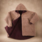 Product flat lay of the Teddy Bear Full-Zip in Camel, highlighting the all-over CloudSherpa™ texture, hood, full-length zipper, and reversible construction.