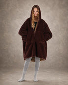 Front view of the Teddy Bear Full-Zip worn on the Chocolate side, featuring the oversized silhouette, hood, and cozy all-over CloudSherpa™ comfort.