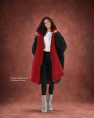 Woman modeling the Teddy Bear Full-Zip in Crimson/Black, showcasing the reversible double-layer CloudSherpa™ design and oversized fit.