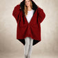 Front view of the Teddy Bear Full-Zip worn on the Crimson side, highlighting plush CloudSherpa™ comfort and the oversized wearable blanket silhouette.
