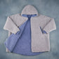 Product flat lay of the Teddy Bear Full-Zip in Light Gray, showcasing the plush CloudSherpa™ texture, oversized hood, and full-zip construction.