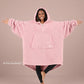 Front view of The Teddy Bear Quarter-Zip wearable blanket in blush showing oversized fit and all-over CloudSherpa™ fabric with hood up