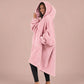 Side view of The Teddy Bear Quarter-Zip wearable blanket in blush highlighting relaxed drape, hood, and plush CloudSherpa™ texture