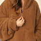 Close-up of The Teddy Bear Quarter-Zip wearable blanket in camel highlighting quarter-zip neckline and plush CloudSherpa™ texture