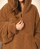 Close-up of The Teddy Bear Quarter-Zip wearable blanket in camel highlighting quarter-zip neckline and plush CloudSherpa™ texture