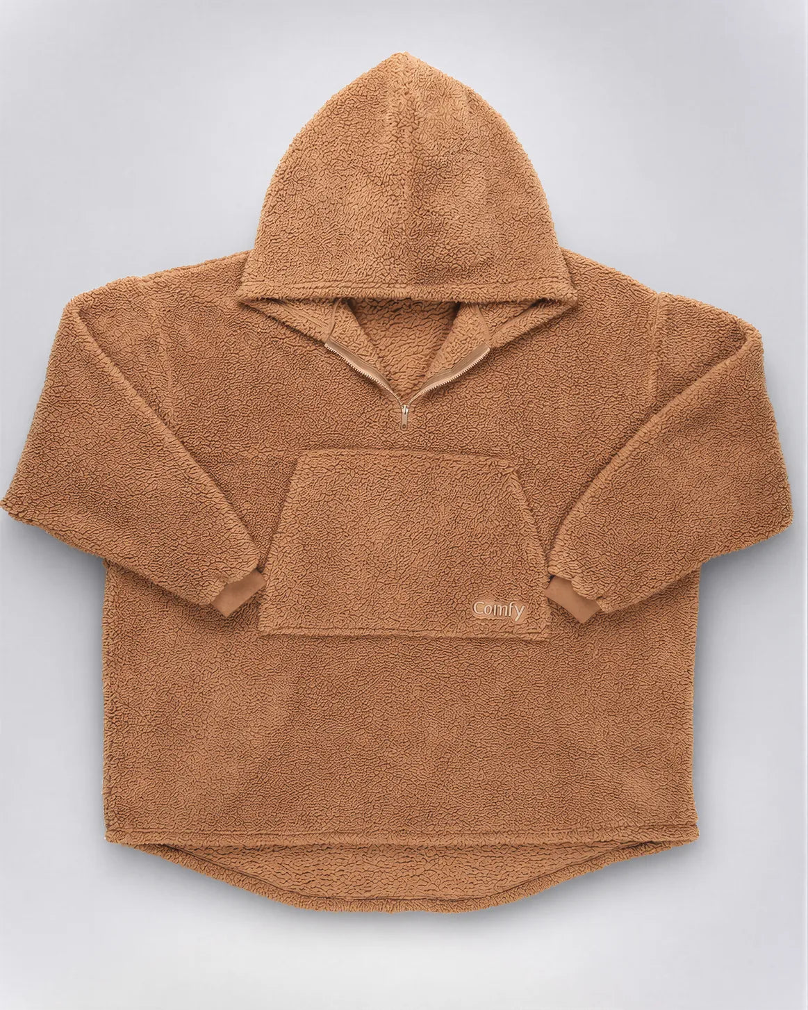 Flat lay of The Teddy Bear Quarter-Zip wearable blanket in camel displaying full shape, hood, front pocket, and all-over CloudSherpa™ construction