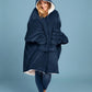 Front view of The Original wearable blanket in blue showing relaxed oversized fit and full coverage