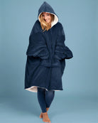 Front view of The Original wearable blanket in blue showing relaxed oversized fit and full coverage